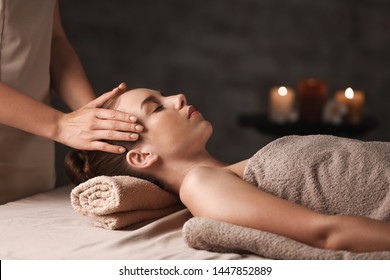 Young woman having massage in spa salon - Shutterstock ID 1447852889