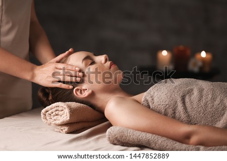 Young woman having massage in spa salon Zdjęcia stock © 