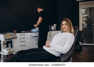 Young Woman Having Meeting With Plastic Surgeon