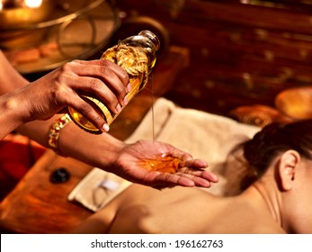 Young Woman Having Oil Massage Spa Treatment.