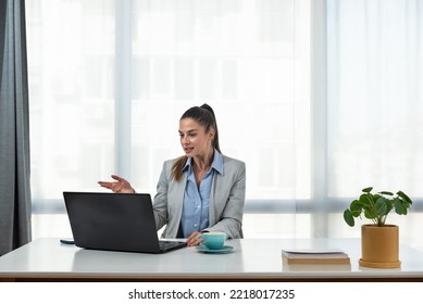 Young Woman Health Care Worker Psychologist And Psychotherapist Talking Online On Web Conference Video Call About How To Reduce Stress And Anxiety In Everyday Life. Female Expert Telemedicine.