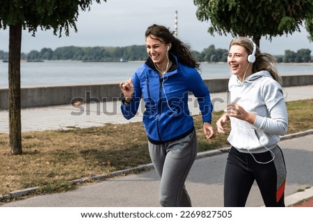 Young woman helps and supports her friend who survived cancer to completely defeat the vicious disease and start a new healthier life with good habits and a healthy body. Illness and new life concept