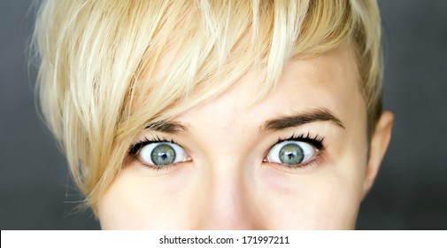 Young Woman With Her Eyes Wide Opened