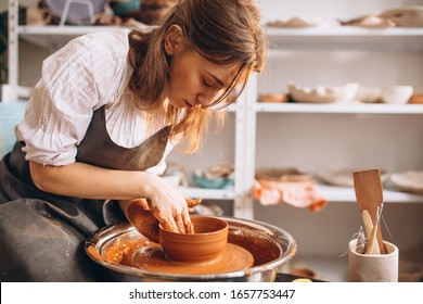 Young Woman At Her Studio On A Pottery Workshop