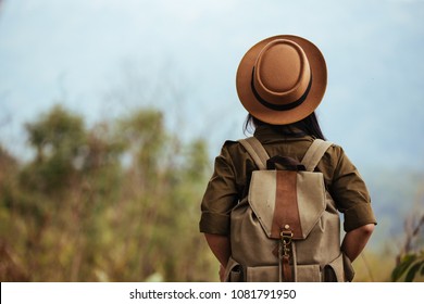 Young Woman Hiker With Backpack Watching Trekking Map, Hiking Concept.