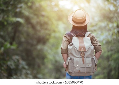 Young Woman Hiker With Backpack Watching Trekking Map, Hiking Concept.