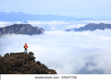 Young Woman Hiker Enjoy The View On Mountain Peak