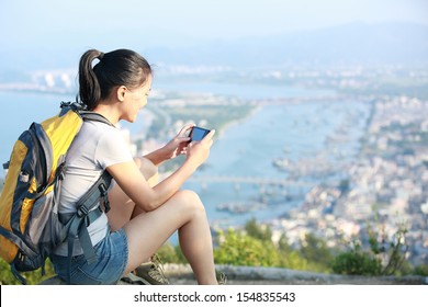 Young Woman Hiker Use Smart Phone Mountain Peak 