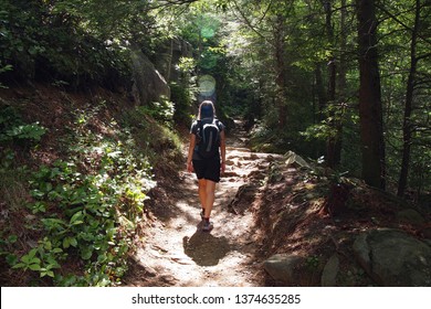 Young Woman Hiking On A Trail In The Great Smoky Mountains National Park, Tennessee, In Early Summer.