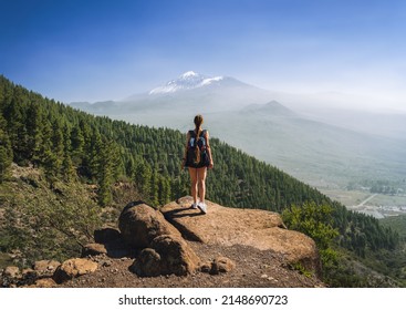 Young woman hiking on the volcano Teide, Tenerife, Spain - Shutterstock ID 2148690723