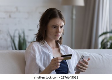 Young Woman Hold Credit Card And Smartphone Try Pay Via E-bank Application Experiences Problem, Feels Annoyed. Lack Of Money, Insecure Unsuccessful Payment, Fraud, Insufficient Funds For E-pay Concept