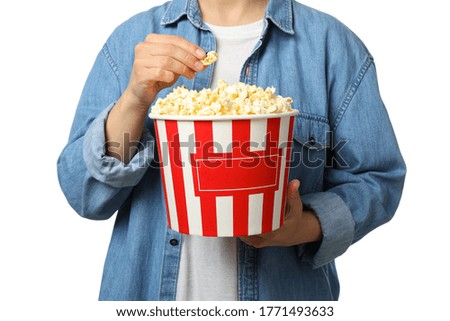 Similar – kleiner Junge Kind mit Popcorn auf blauem Hintergrund