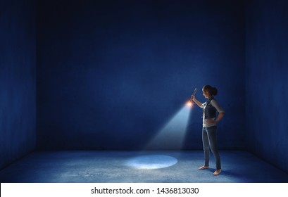 Young Woman Holding A Flashlight