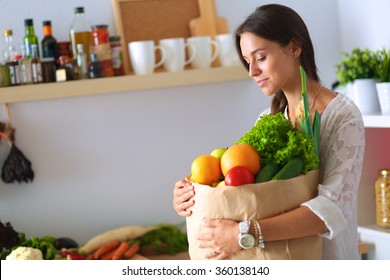 7,806 Woman grocery bag kitchen Images, Stock Photos & Vectors ...