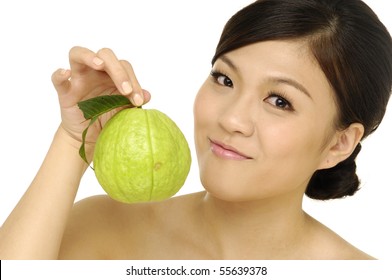 Young Woman Holding Guava Fruit Close Up,