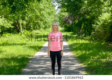 Similar – Porträt einer jungen Frau geht als Training nach draußen.