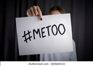 young woman holding #MeToo poster. concept protests against sexual harassment. close up,selective focus
