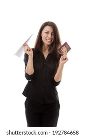 Young Woman Holding A Paper Airplane And A British Passport