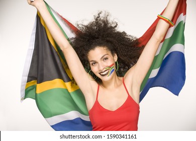 Young Woman Holding South African Flag