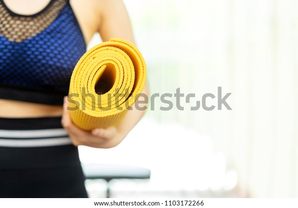 Young Woman Holding Yellow Yoga Mat Stock Photo Edit Now 1103172266