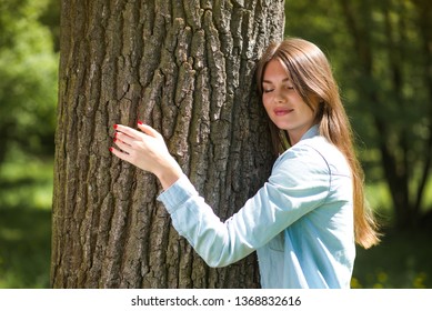 Young Woman Hugging A Big Tree, Love Nature Concept