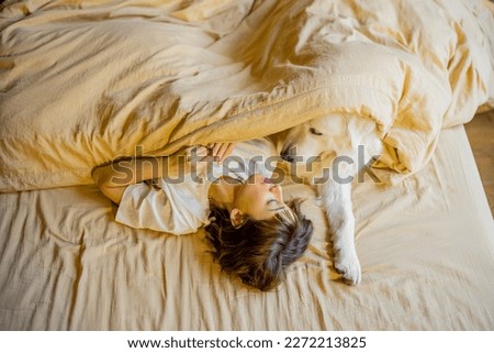 Similar – Newborn baby with pompom hat sleeping on blanket