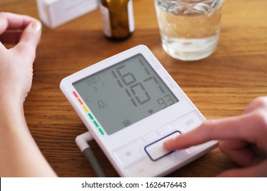 Young Woman With Hypertension Is Controlling Her Blood Pressure.