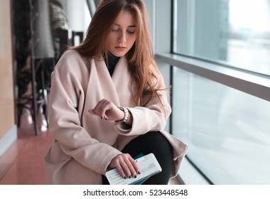 Young woman in international airport.