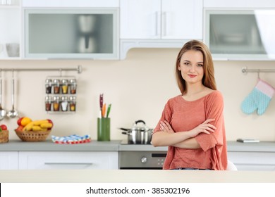 Young Woman In The Kitchen