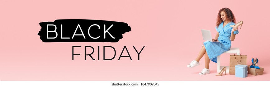 Young woman with laptop and new shoes on color background. Black Friday sale