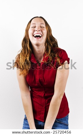 Young woman laughing into the camera