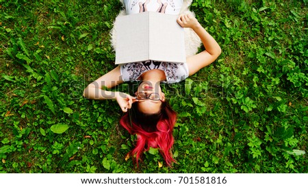 Similar – Image, Stock Photo Young redhead woman reading a red book