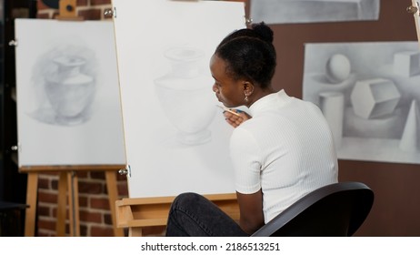 Young Woman Learning To Draw Vase Sketch On Paper, Attending Art School Program For Personal Development And Growth. Drawing Inspiration Model On Canvas, Using Artistic Tools. Tripod Shot