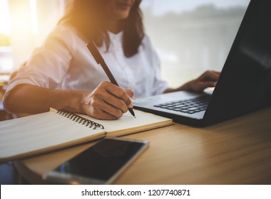 young woman  with learning language during online courses using netbook