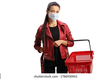 Young Woman In A Leather Jacket With A Shopping Basket Wearing A Protective Face Mask Isolated On White Background