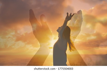 Young Woman Letting Go Of Problems , And Feeling Free With Arms In The Air. Praise And Worship Concept.  