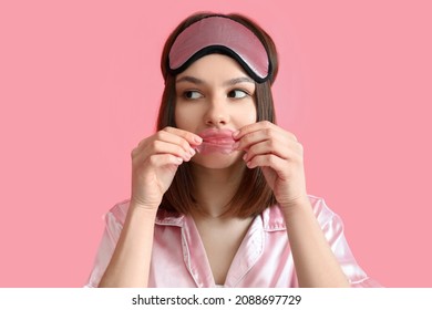 Young Woman With Lip Mask On Color Background