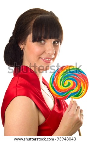 Young woman with lollipop isolated on white