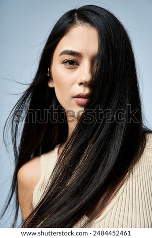 Woman with long hair flying in the wind