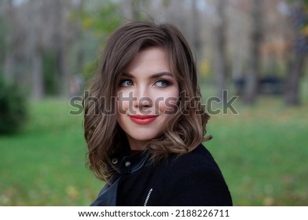 Young woman with long bob hairstyle outside