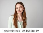 Young Woman With Long Brown Hair and Blue Eyes