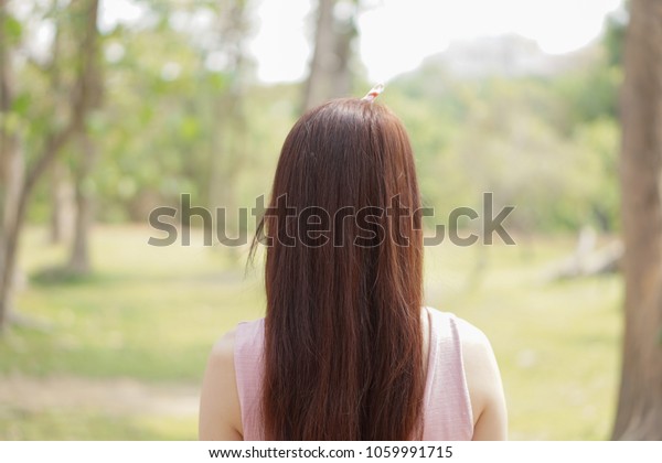 Young Woman Long Brown Hair Relaxing Stock Photo Edit Now 1059991715