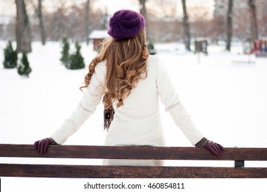 Young Woman With Long Hair Photographed From Behind