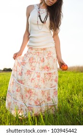 Young Woman In Long Skirt And Tank Top