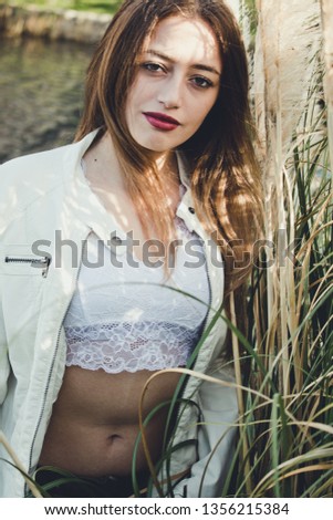 Similar – Young woman doing yoga in nature