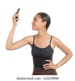 Young Woman Looking At The Hand Held, Make-up  Mirror With Different Facial Expressions. Body Language. Happy, Surprised, Open. Isolated On White .