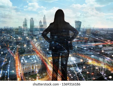 Young Woman Looking Over The City Of London. London Covered By Wifi Connections. Neon Lights