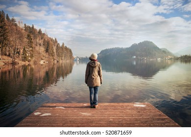 Young Woman Looking Over The Lake, Winter Atmosphere In Bledâ??s Lake