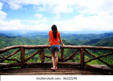 Young Woman Looking At Sky