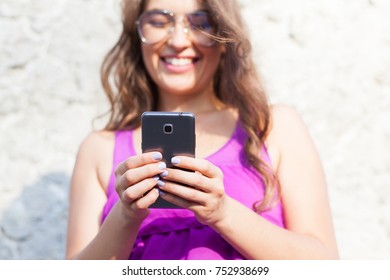 young woman looking at smartphone  - Shutterstock ID 752938699